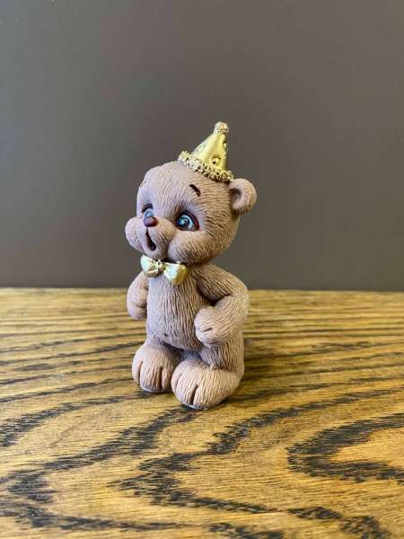 Мишка №2 задувает свечку